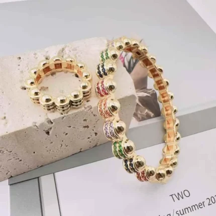 اسوارة مع خاتمها ستايل الدهب